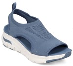 Pair of shoes called Clancy. These shoes are in a solid blue colour with white soles.